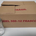 Bote de cristal modelo celdilla de 1/2 kg de miel de capacidad. Caja 12 unidades